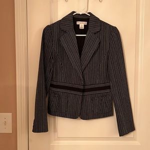 Black and white blazer dressed for any business affair.